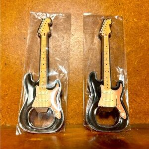 FENDER guitar shaped bottle opener magnets.  You are buying both.